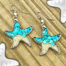 Load image into Gallery viewer, Sand Starfish Earrings in Teal Turquoise are displayed on a wooden surface.