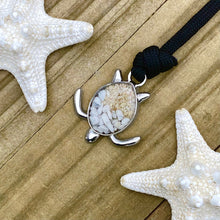 Load image into Gallery viewer, Black Rope Sand Sea Turtle Bracelet in White Turquoise is displayed in a wooden surface.