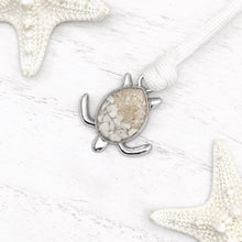 Load image into Gallery viewer, White Rope Sand Sea Turtle Bracelet in White Turquoise is displayed on a white wooden surface.