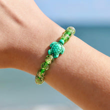 Load image into Gallery viewer, Glowing Glass Bead Sea Turtle Bracelet - GoBeachy