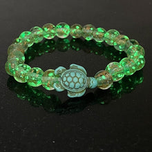 Load image into Gallery viewer, Glowing Glass Bead Sea Turtle Bracelet - GoBeachy
