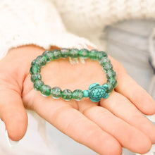 Load image into Gallery viewer, Glowing Glass Bead Sea Turtle Bracelet - GoBeachy