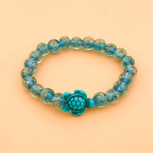 Load image into Gallery viewer, Glowing Glass Bead Sea Turtle Bracelet - GoBeachy