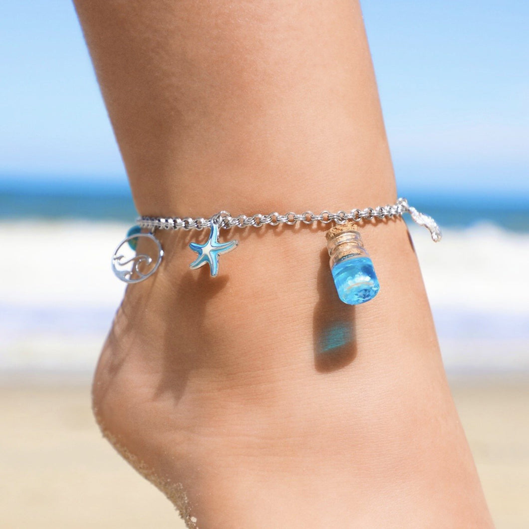 Drift Bottle Anklet displayed by being worn on a woman's ankle.