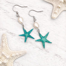 Load image into Gallery viewer, Freshwater Pearl Starfish Earrings displayed on a white wooden surface, perfect for beach lovers.