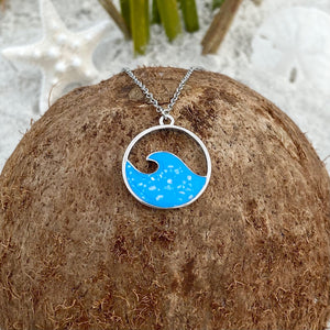 Glittering Wave Necklace is placed on top of a dried coconut.