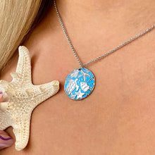 Load image into Gallery viewer, Into the Blue Necklace displayed by being worn around a woman&#39;s neck.