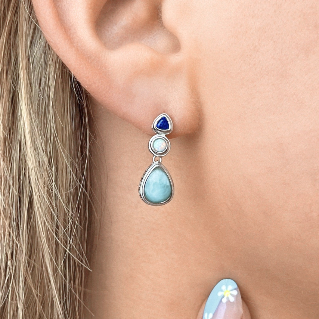 Larimar Drop Earring displayed by being worn on a woman's ear.