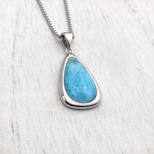 Load image into Gallery viewer, Larimar Drop Necklace displayed on a white wooden surface.