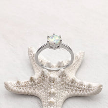 Load image into Gallery viewer, Minimalist Opal Ring displayed by being placed on a white artificial starfish.