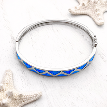 Load image into Gallery viewer, Opal Aztec Hoop Bracelet displayed on a white wooden surface.