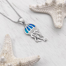Load image into Gallery viewer, Opal Don&#39;t Be Jelly Necklace is positioned on top of a white wooden surface.