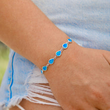 Load image into Gallery viewer, Opal Droplet Bracelet worn on a woman&#39;s arm.