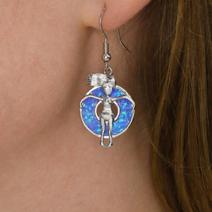 Opal Floatie Girl Earring displayed while being worn, captured in a close-up shot.