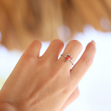 Load image into Gallery viewer, A hand displaying the Opal Lobster Ring.