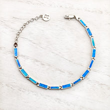 Load image into Gallery viewer, Opal Paradise Chain Bracelet displayed on a white wooden surface.
