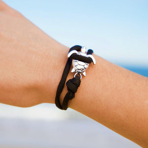 Wrapped Sea Turtle Bracelet displayed by being worn around a woman's wrist.