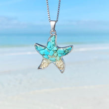 Load image into Gallery viewer, Sand Starfish Necklace hanging against a blurred beach background, perfect for beach-themed accessories.