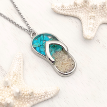 Load image into Gallery viewer, Turquoise Sandy Toes Necklace displayed on a white wooden surface.