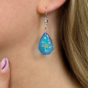 Under the Sea Earring displayed by being worn on a woman's ear.