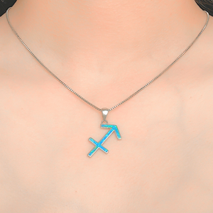 Opal Sagittarius Necklace displayed closely by being worn around a woman's neck.