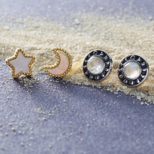 Load image into Gallery viewer, Moonstone Moon Phase and Opal Starry Night Studs are placed on sandy grains.