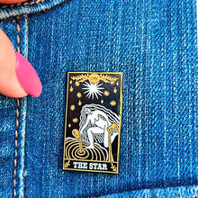 Load image into Gallery viewer, The Star Tarot Card Pin displayed on denim cloth.