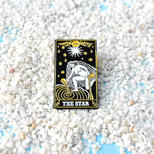 Load image into Gallery viewer, The Star Tarot Card Pin displayed on sandy terrain.